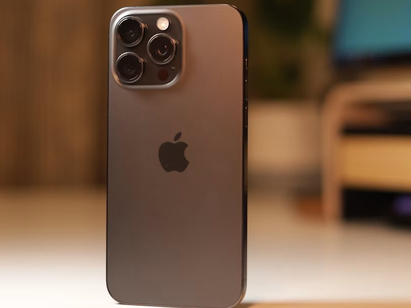 a close up of a cell phone on a table